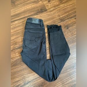 American Eagle black denim skinny jeans.